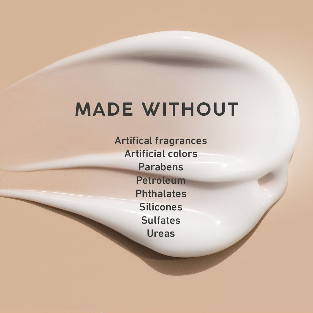 White cream swatch on a beige background with text listing ingredients not used.
