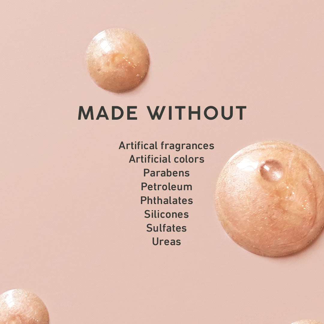 Two beige cosmetic products on a pink background with text listing ingredients not used.