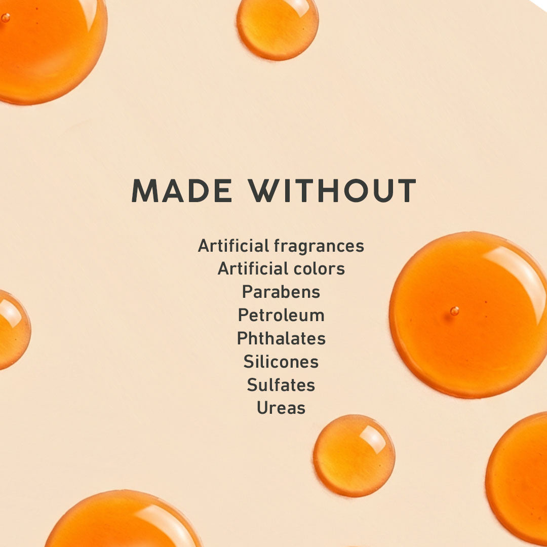 Orange droplets on a beige background with 'MADE WITHOUT' text and listed ingredients.