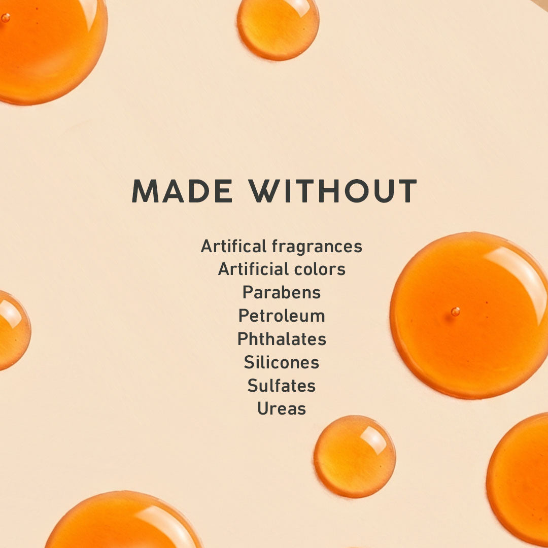 Orange droplets on a beige background with 'MADE WITHOUT' text and listed ingredients.