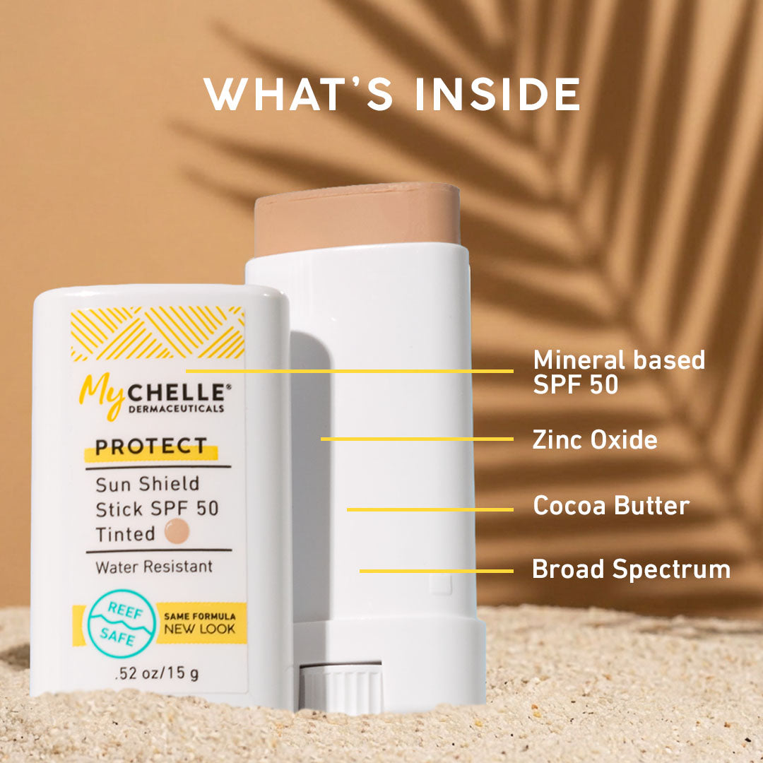 MyChelle Sun Shield Stick with product details on a sand and leaf background
