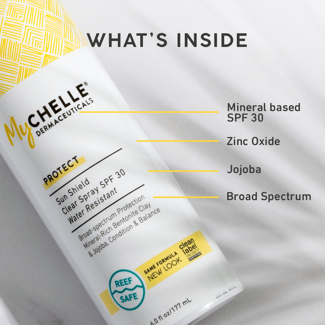 MyChelle Dermaceuticals Sun Shield Clear Spray SPF 30 on a white background with text detailing its ingredients.
