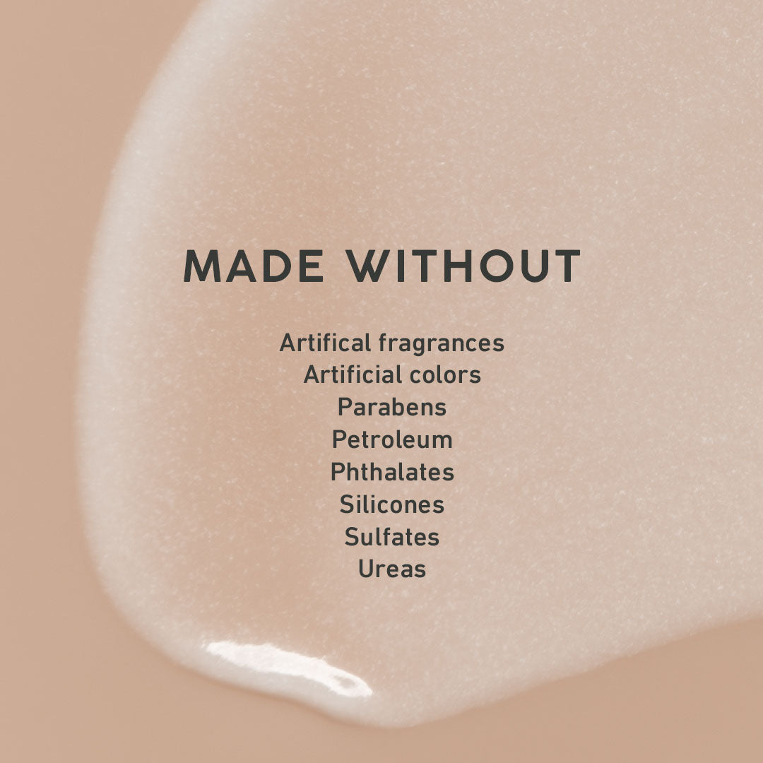 Cosmetic product with 'MADE WITHOUT' text listing ingredients on a beige background