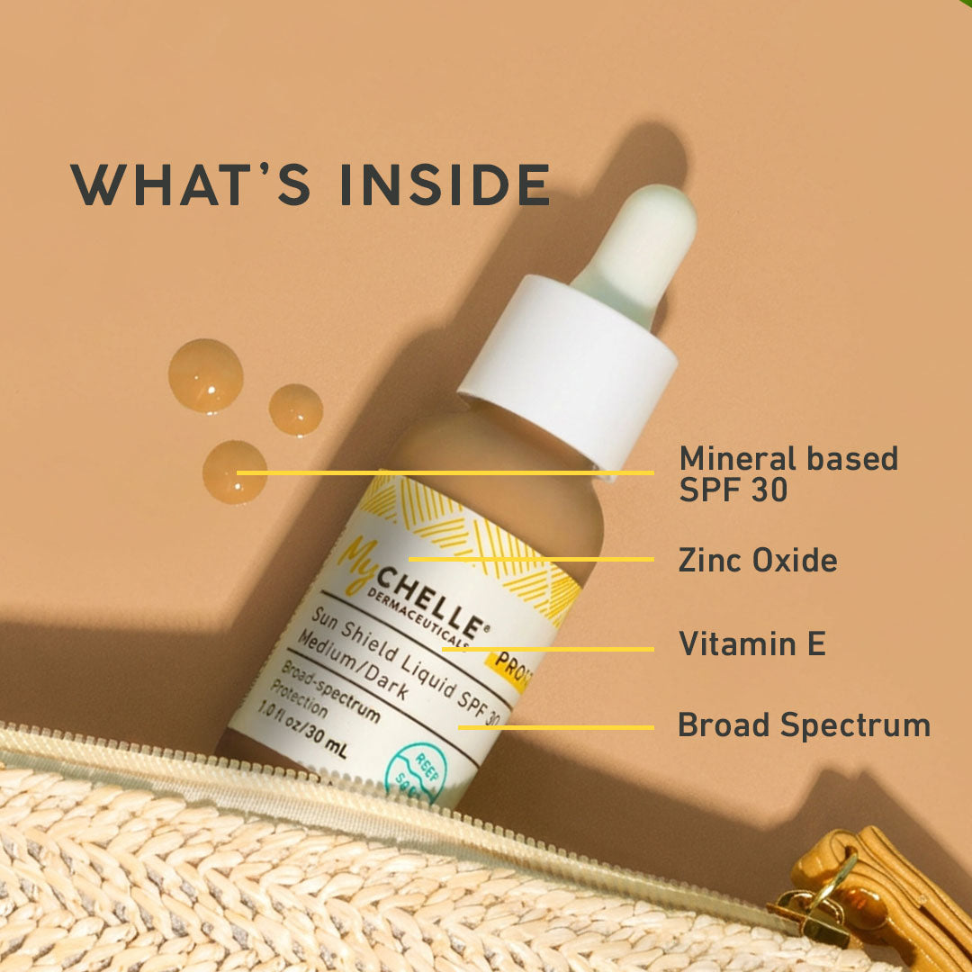 MyChelle Sun Shield Liquid SPF 30 bottle with dropper on a beige background