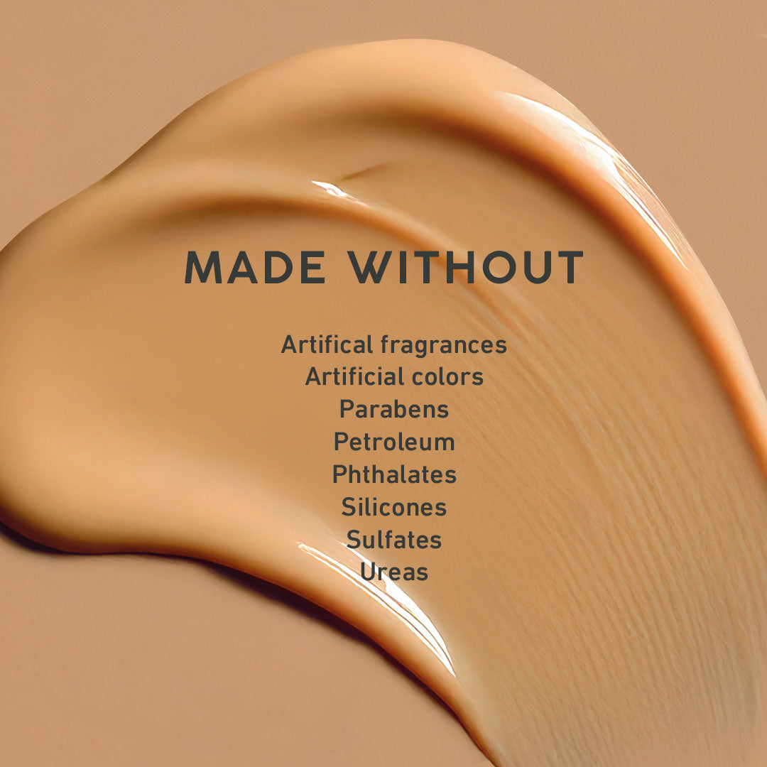 Cosmetic foundation swatch with 'Made Without' text on a beige background