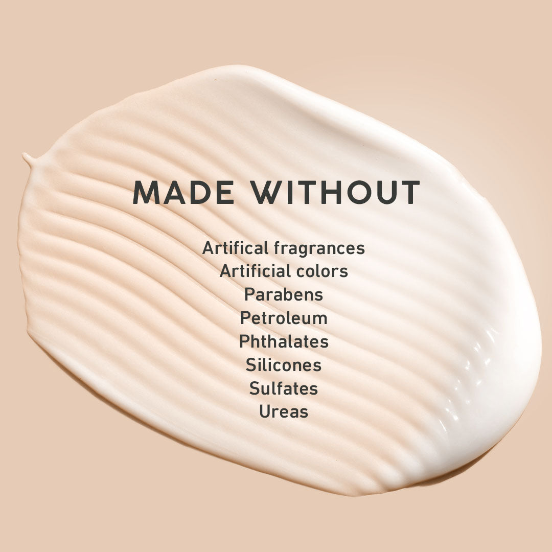 Beige cream with text listing ingredients it is 'Made Without' on a beige background
