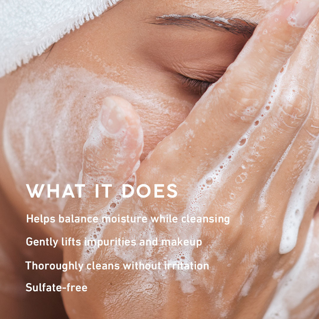 A woman washing her face with MyChelle Ultra Hyaluronic Hydrating Cleanser stating what this cleanser does for the skin.