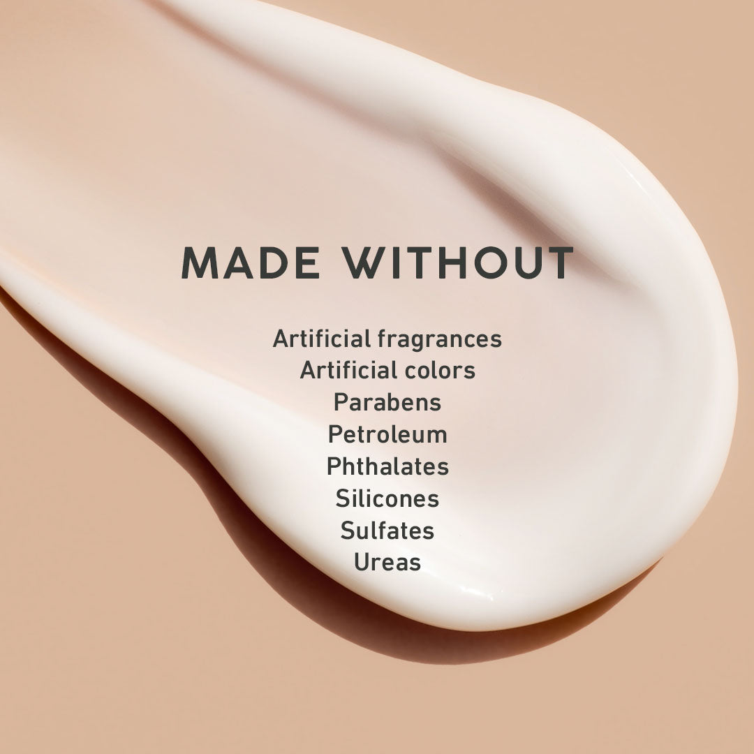 Image of white cream on a tan background with the words "Made Without" stating all the harmful ingredients that are not in this cream.