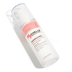 A pump bottle of MyCHELLE Fruit Enzyme Cleanser with a white label featuring red and orange accents. Label states it resurface skin and purify pores.