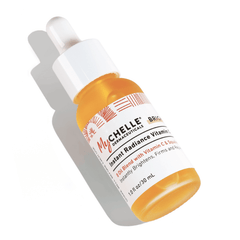 A bottle of MyChelle Dermaceuticals Instant Radiance Vitamin C Oil Blend on a white background