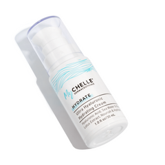 A white pump bottle labeled Ultra Hyaluronic Hydrating Cream from MyCHELLE, designed for moisturizing the skin.